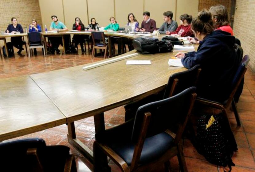 
University of Dallas students participate in a discussion of "The Scarlet Letter" in an...