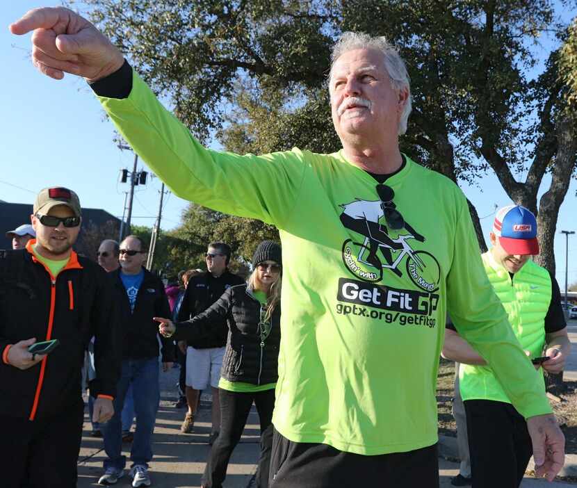 
Jensen leads a small crowd around Grand Prairie’s downtown area, pointing out the...