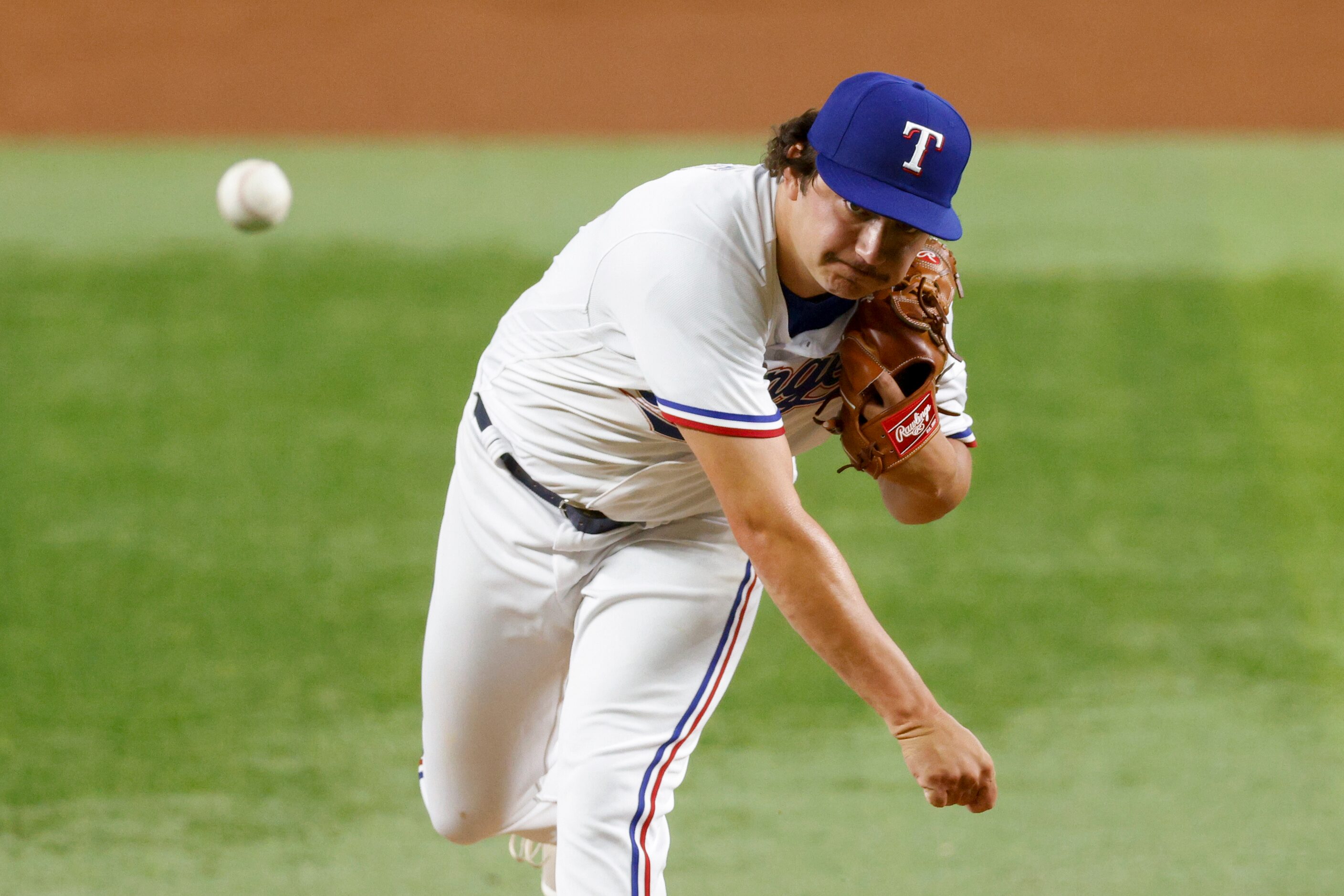 Texas Rangers relief pitcher Owen White (43) delivers a pitch during the sixth inning of a...