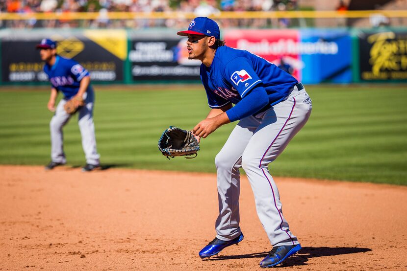 Texas Rangers first baseman Ronald Guzman takes his defensive position during the fifth...