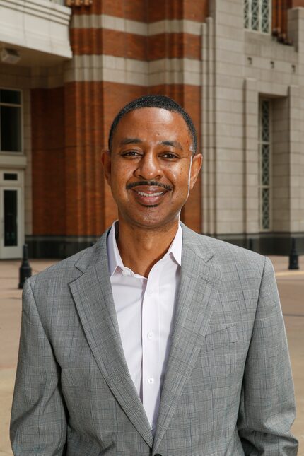 Corey Anthony (left), chief diversity officer at AT&T, poses for a photograph Wednesday,...