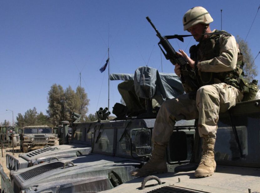 ORG XMIT: S0382313343_WIRE U.S. Army Sgt. Korry Black, of Westmorland, Tenn., cleans his...