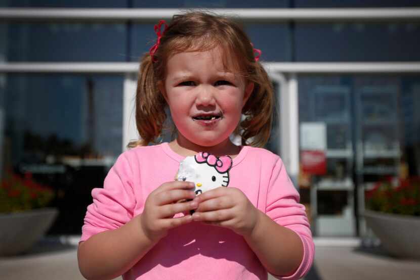 Three-year-old Avery Hulke, at least, happily sampled her new Hello Kitty cookie.