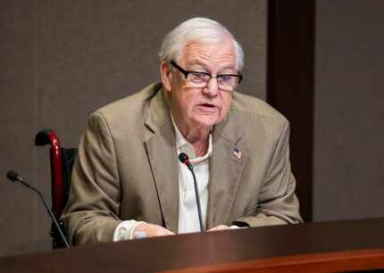 Plano City Council member Tom Harrison defends his post on social media during a hearing on...