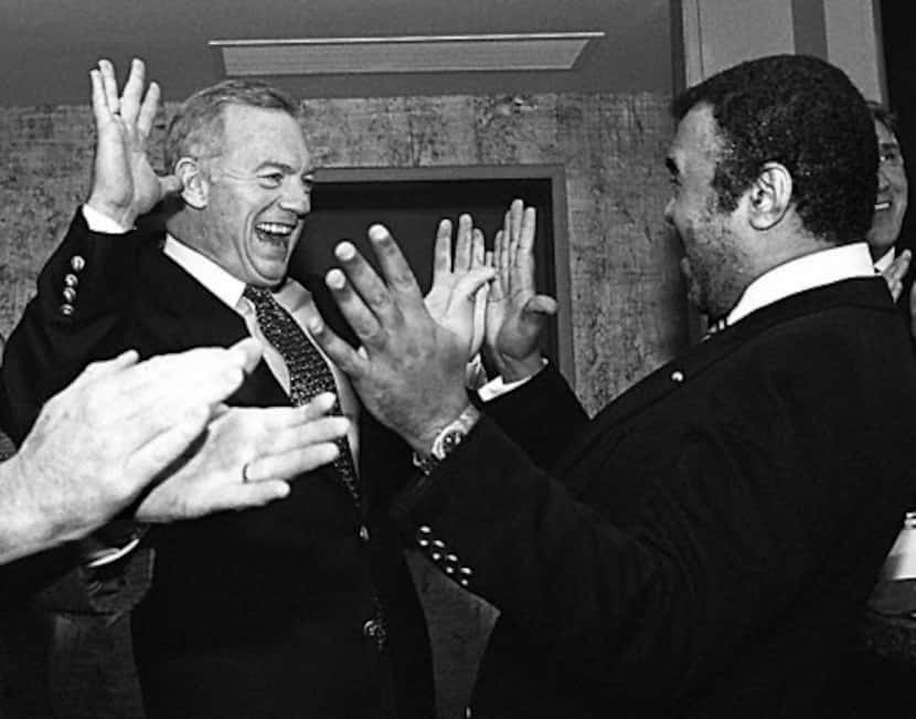 Caption: 1-21-94..Jerry Jones is all smiles and celebrates a  touchdown during the...