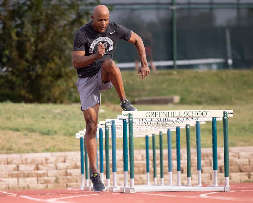Don Drummond, 52, warms up on the track at Greenhill School in Addison. The Dallas resident...