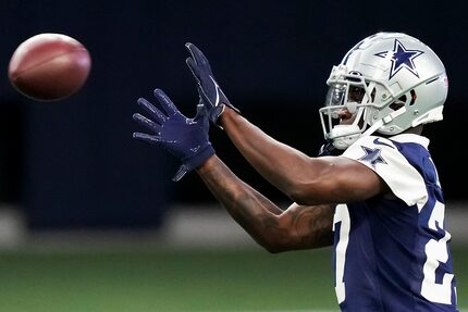 Dallas Cowboys safety Jayron Kearse catches a ball during the OTA team's practice at The...