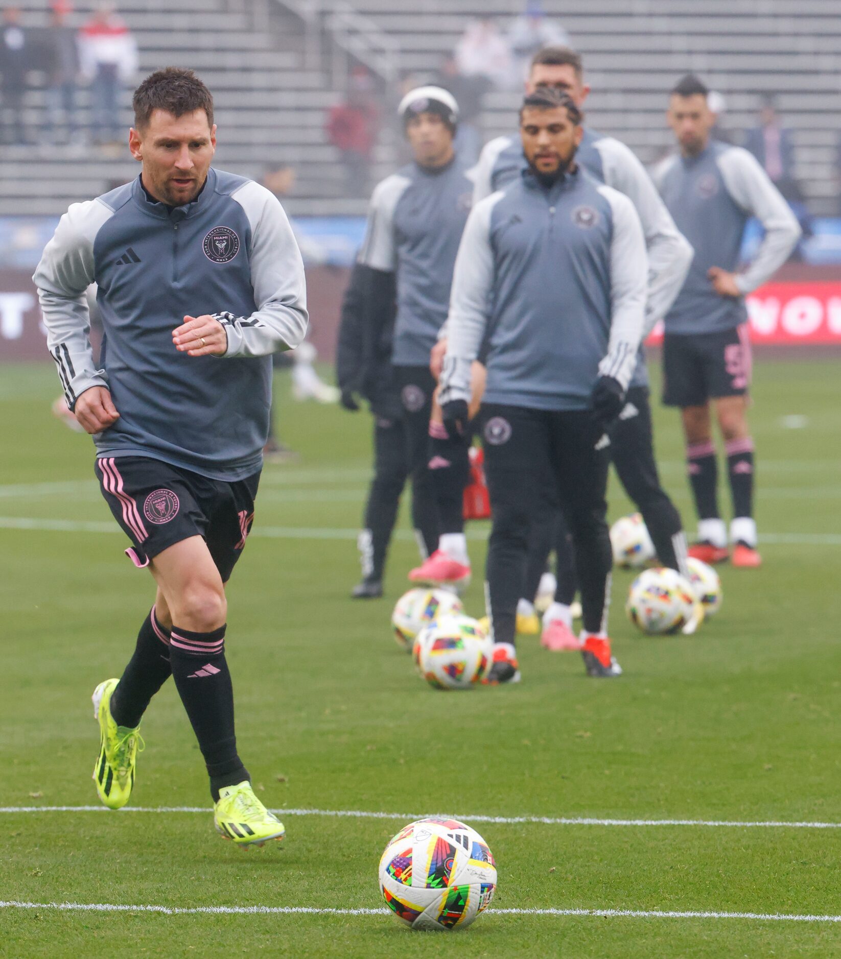 Inter Miami forward Lionel Messi warms up ahead of a preseason friendly soccer game against...