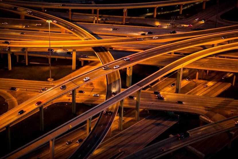 Traffic twists through the High Five Interchange, the five level intersection of LBJ Freeway...