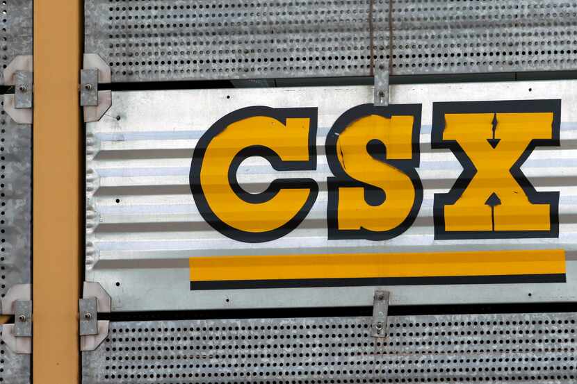 FILE - This July 15, 2013 file photo shows a CSX logo on a train car in Nashville, Tenn. CSX...