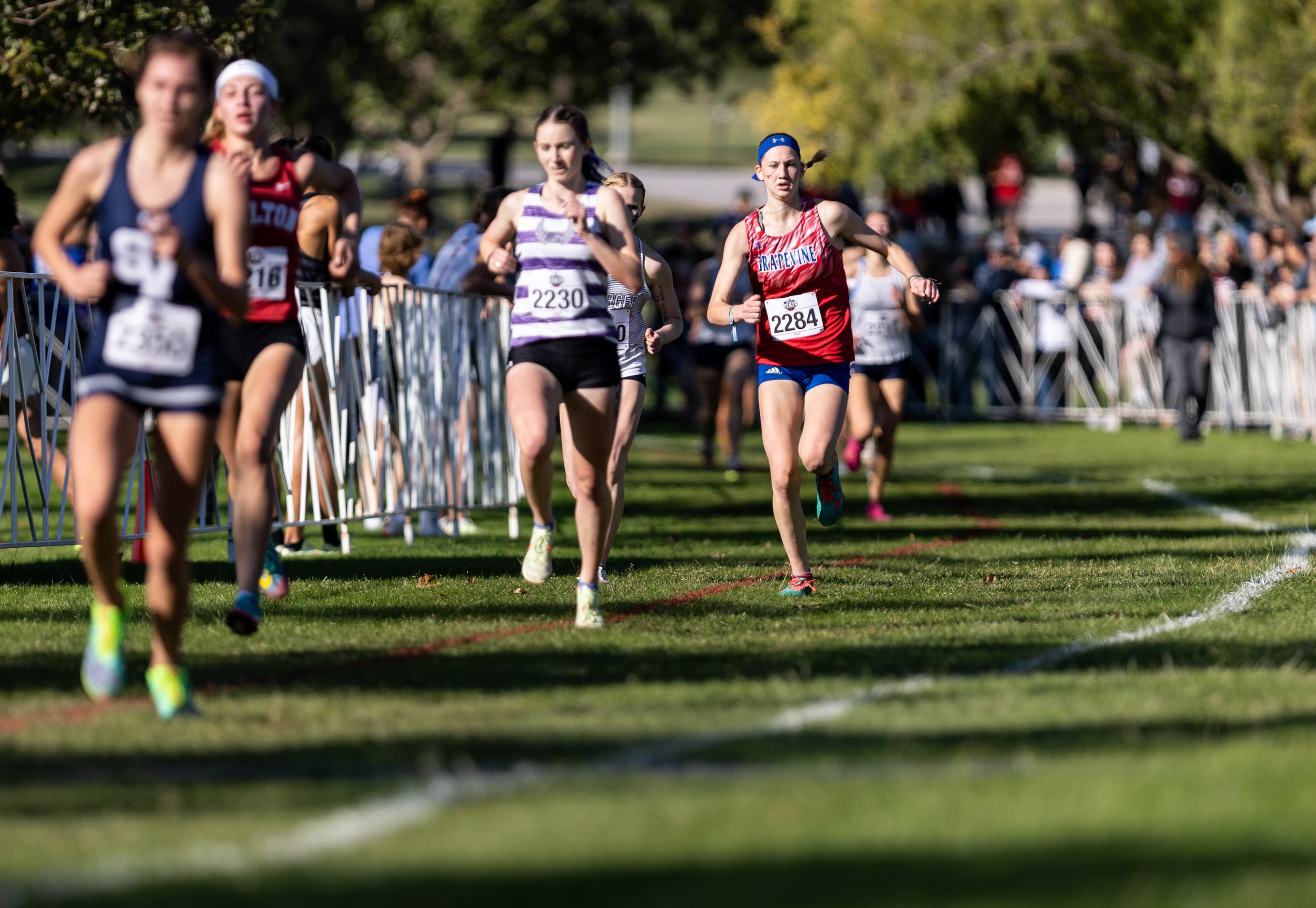 Kylie Himes of the Grapevine Mustangs competes in the 5A girls’ 3200m race during the UIL...