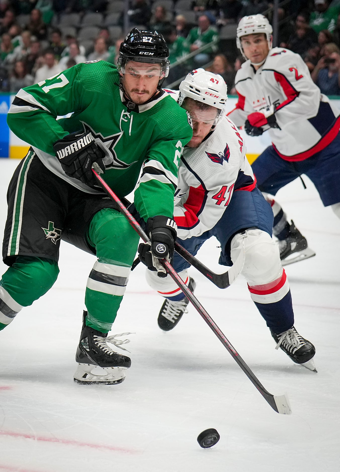 Dallas Stars left wing Mason Marchment (27) fights for the puck against Washington Capitals...