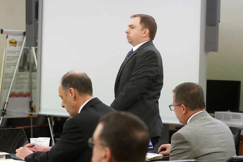 Aaron Dean stands for the beginning of the sentencing phase of his trial at Tarrant County's...
