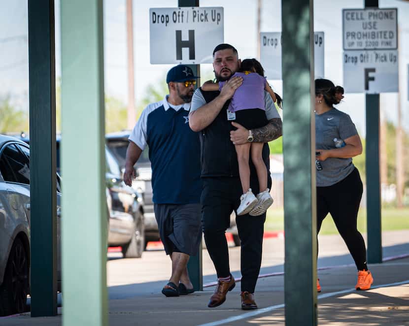 Families reunite with their children at Tom Green Elementary in Buda, Texas, after pre-K...