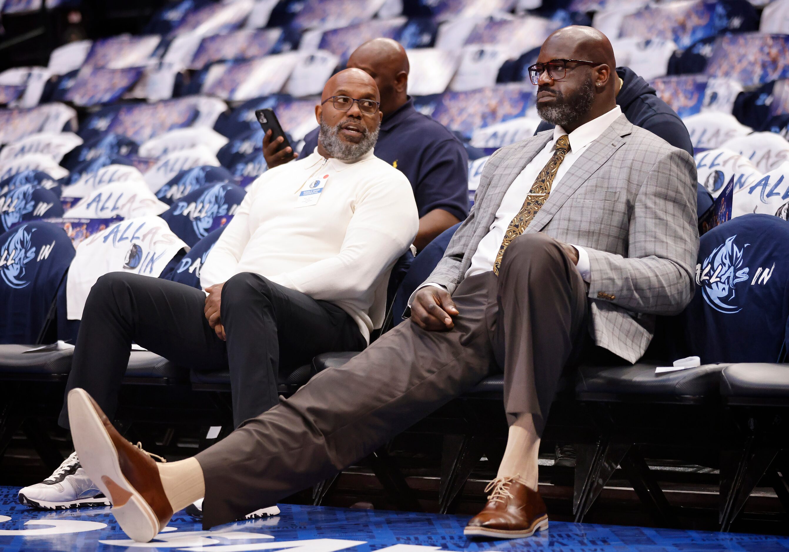 TNT sports broadcaster Shaquille ‘Shaq’ O’Neal (right) and Jerome Crawford visit as they...