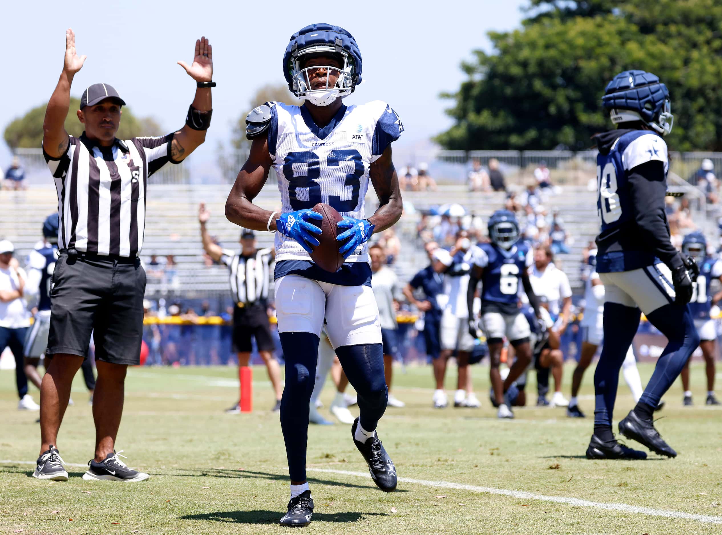 Dallas Cowboys wide receiver Jalen Brooks (83) caught a touchdown pass in the back of the...