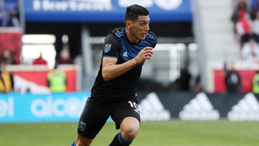 San Jose Earthquakes forward Cristian Espinoza moves the ball up the pitch during the first...