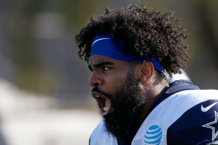 Dallas Cowboys running back Ezekiel Elliott yells during the afternoon practice at the...