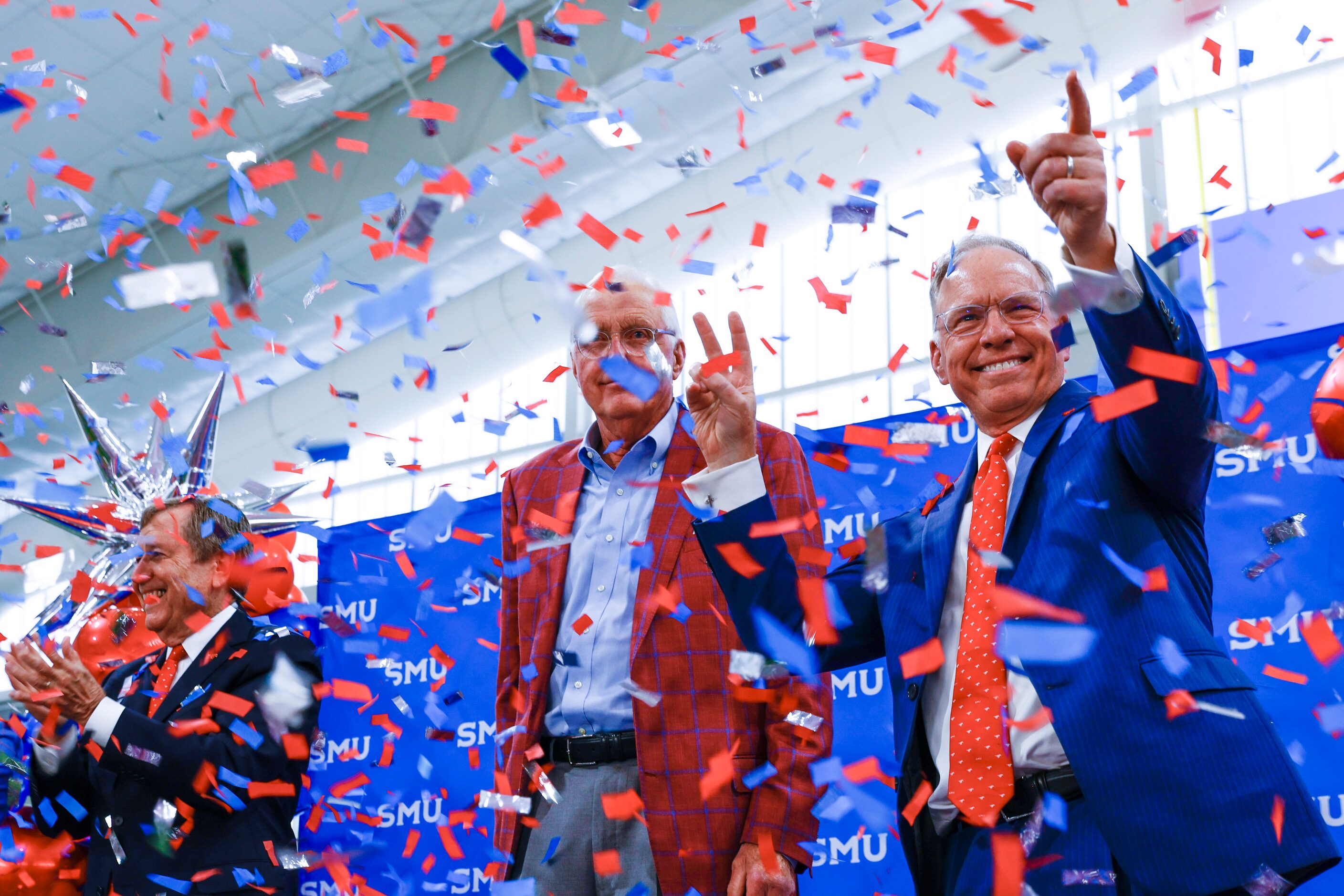 From left, SMU President R. Gerald Turner, board chair David Miller and development and...