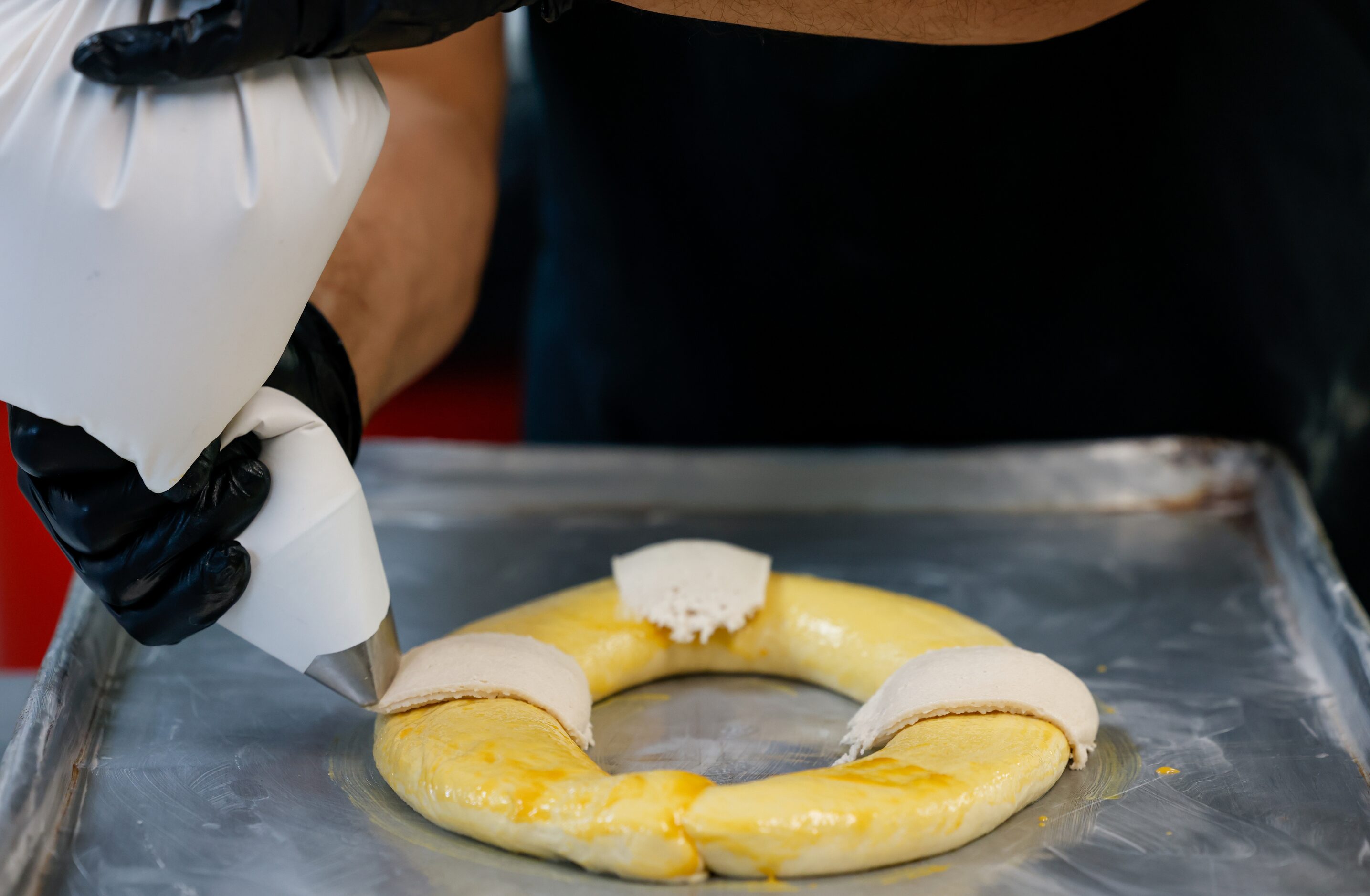 Baker Isaac Ramirez prepares Rosca de Reyes at Tango Bakery in Garland on Thursday, Jan. 5,...