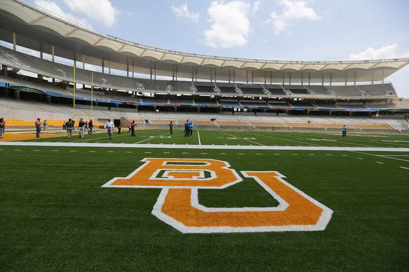 FILE — This Aug. 18, 2014 file photo shows the Baylor University logo on the football field...