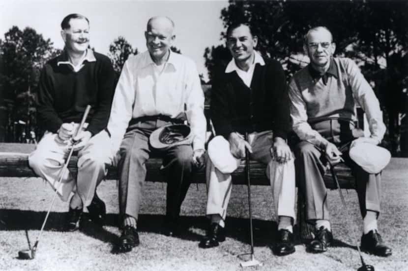 In 1953 at Augusta National Golf Club, Byron Nelson (left) poses with President Dwight D....