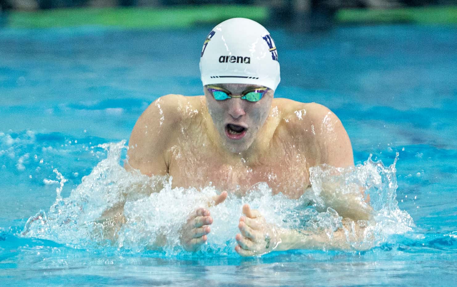Keller’s Maximus Williamson competes in the boys 200 individual medley race during the 6A...