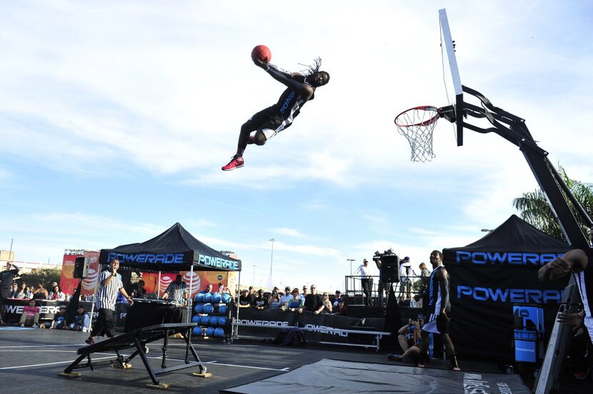 Javoris Carlisle AKA Wild Style of Powerade's Air Elite group dunks the ball at the 2014...