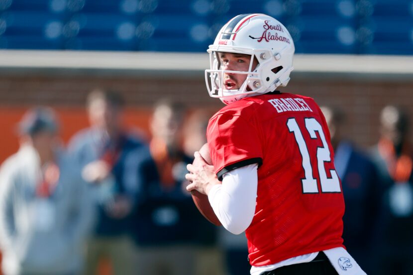 American quarterback Carter Bradley of South Alabama runs through drills during practice for...