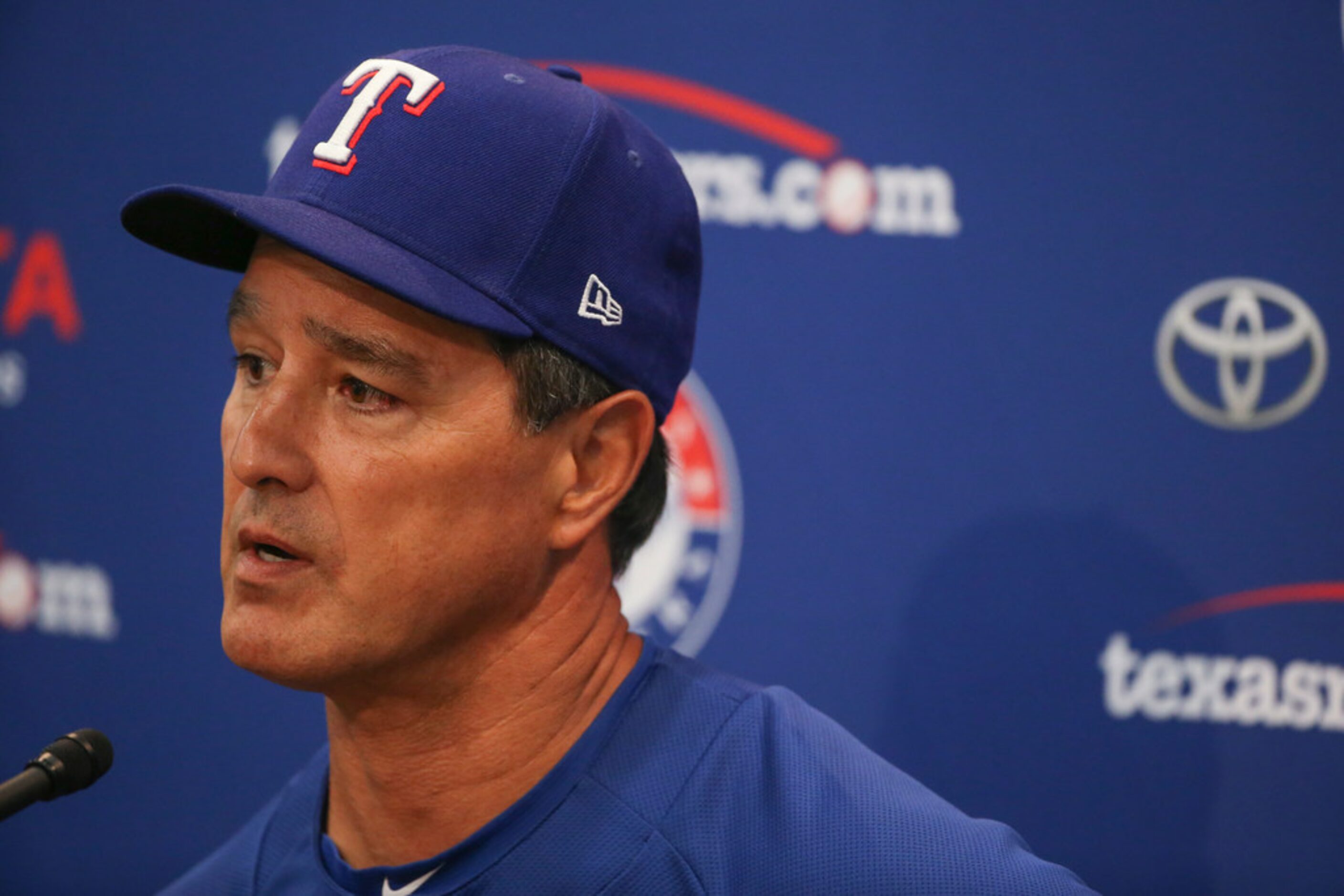 Don Wakamatsu, who has been named interim manager of the Texas Rangers, addresses members of...