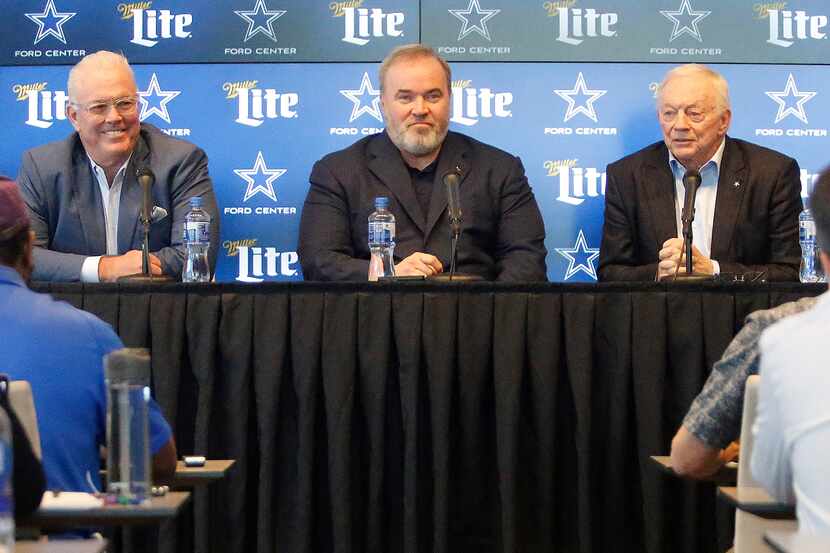 Stephen Jones (left), Mike McCarthy, and Jerry Jones address the media as the Dallas Cowboys...