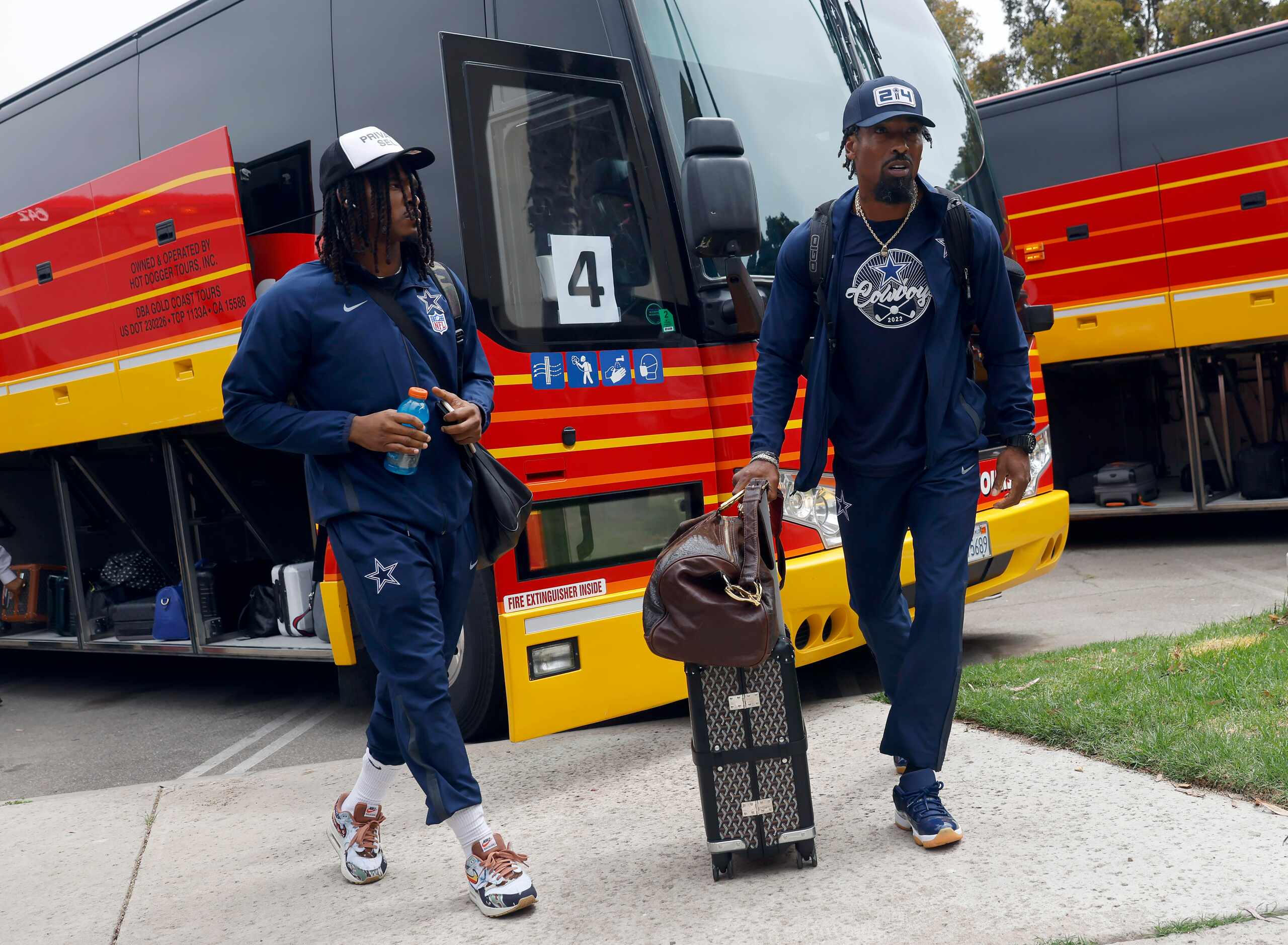 Dallas Cowboys running back Rico Dowdle (left) and assistant secondary coach Al Harris...