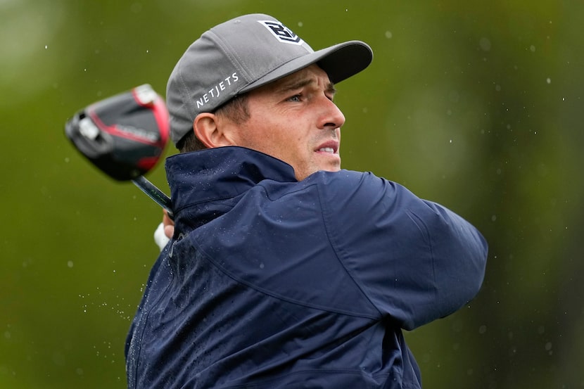 Bryson DeChambeau watches his tee shot on the sixth hole during the third round of the PGA...