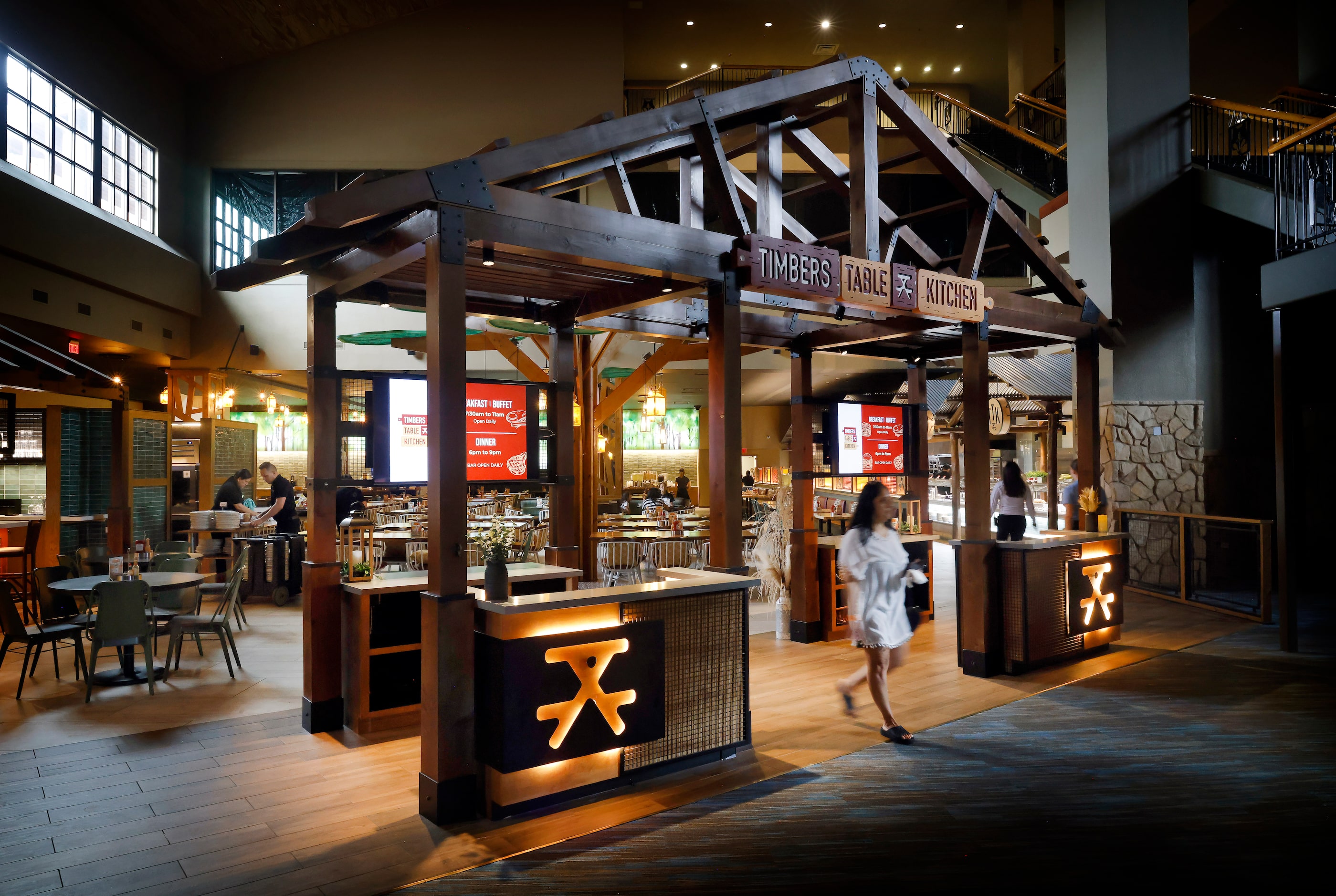 The renovated Timbers Table & Kitchen dining space adjacent to the lobby is seen from above...