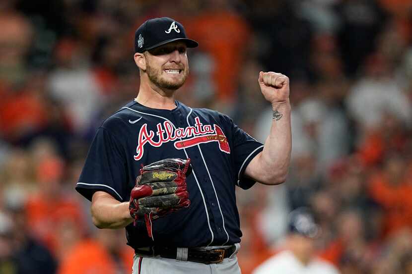 FILE - Atlanta Braves relief pitcher Will Smith celebrates an out against the Houston Astros...