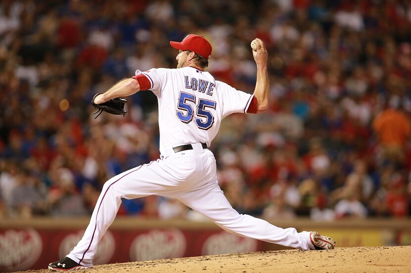 ARLINGTON, TX - MAY 19: Derek Lowe #55 of the Texas Rangers throws in the sixth inning...