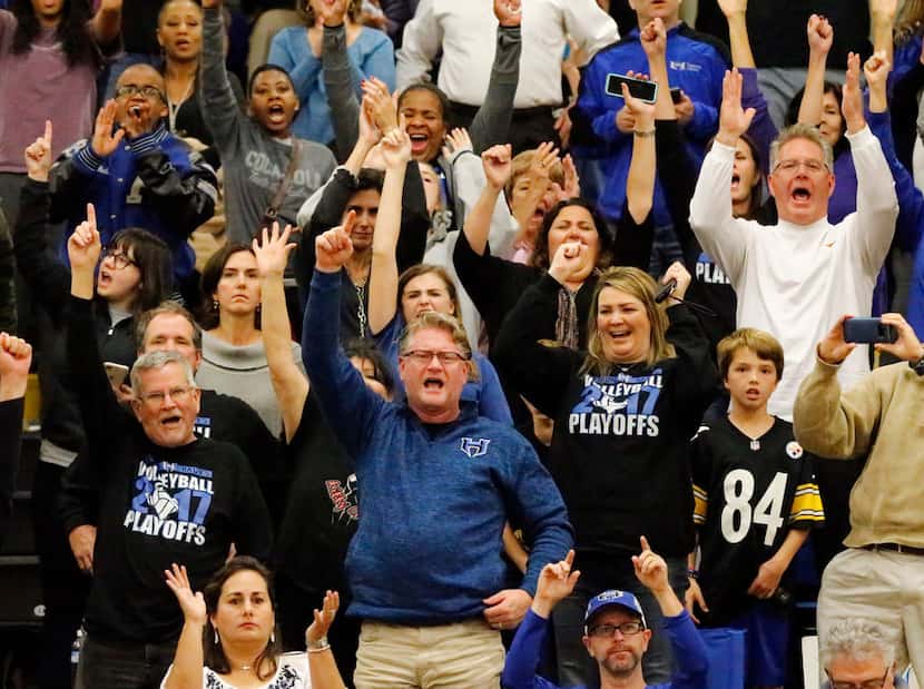 Hebron fans celebrate as their team sweeps Plano West in a Class 6A Region I quarterfinal at...
