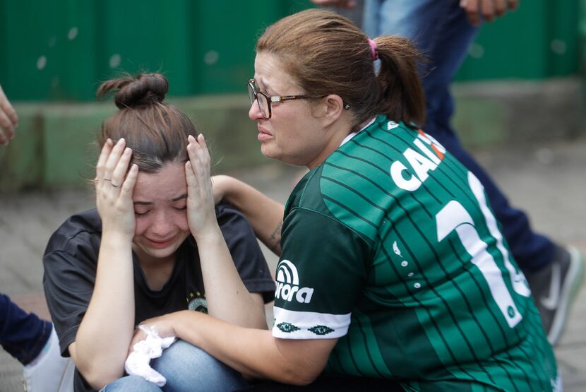 Fans of Brazil's soccer team Chapecoense mourned outside the Arena Conda stadium in Chapeco,...