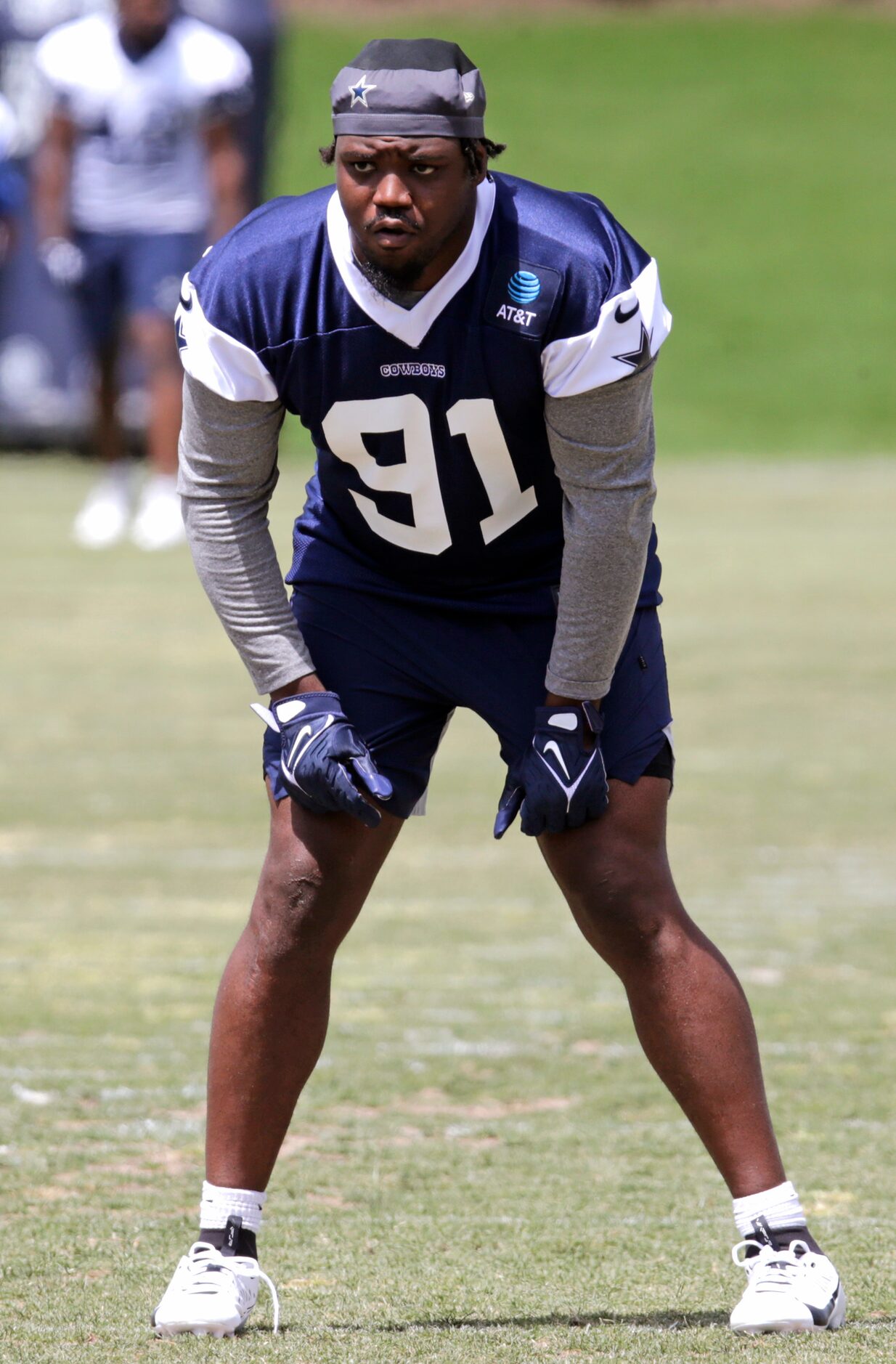 Cowboys rookie defensive end Tyrus Wheat (91) participates in a drill as the Dallas Cowboys...