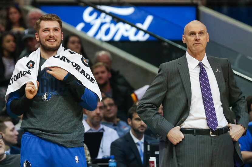 Dallas Mavericks forward Luka Doncic (77) and Dallas Mavericks head coach Rick Carlisle...