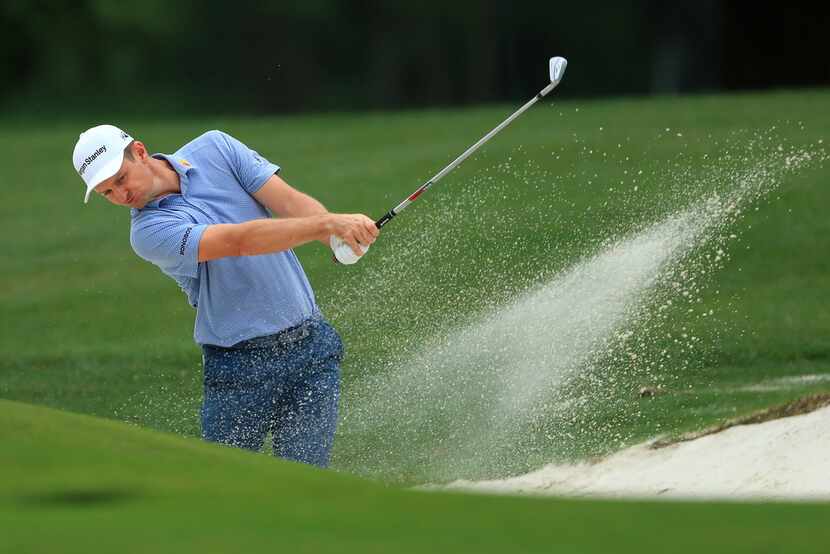 CHARLOTTE, NORTH CAROLINA - MAY 03: Justin Rose of England plays a shot from a bunker on the...