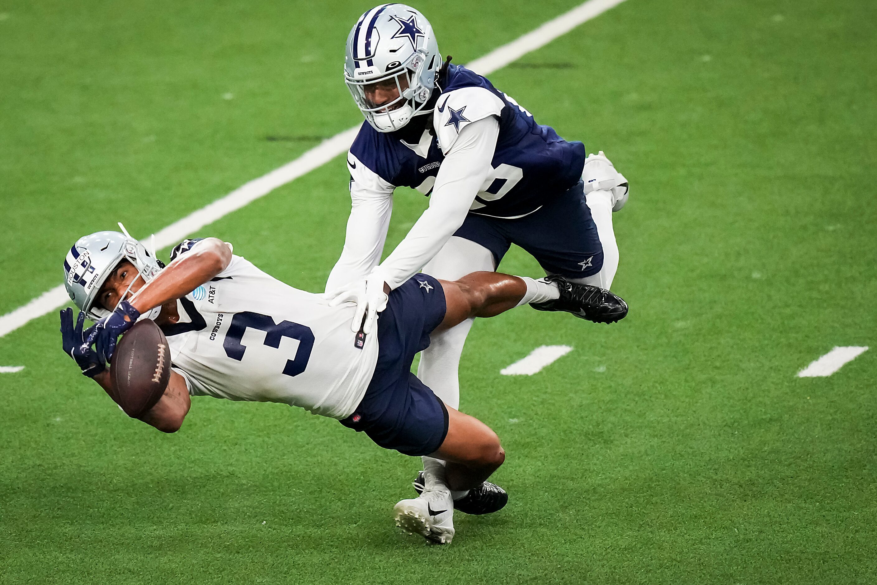 Dallas Cowboys wide receiver Dennis Houston (3) can’t make a diving catch as safety Malik...