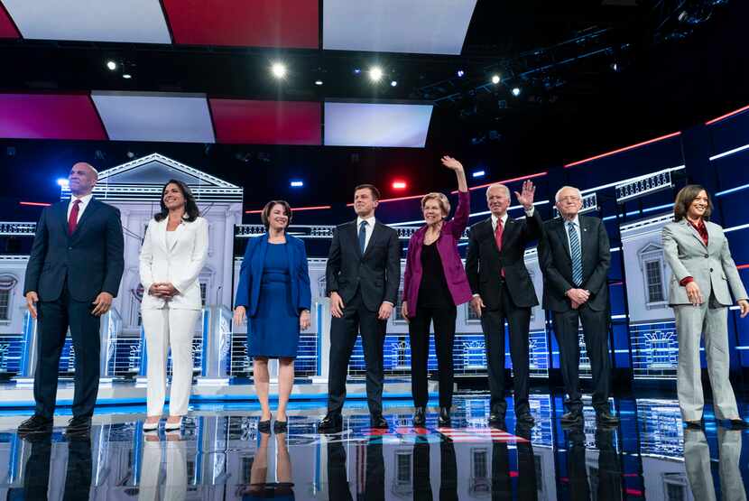 Democratic presidential candidates Sen. Cory Booker of New Jersey, Rep. Tulsi Gabbard of...