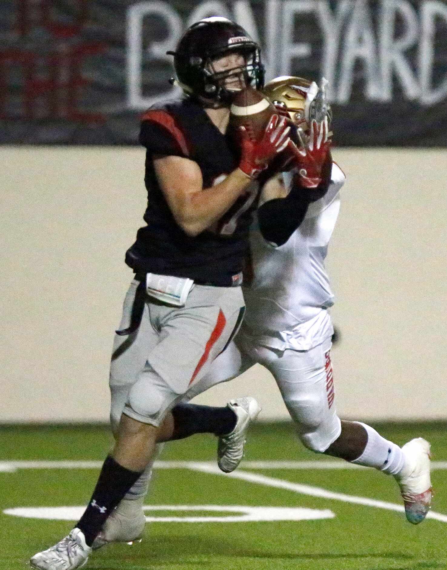 Lake Highlands High School wide receiver Will Hutton (17) hauls in a pass after getting...