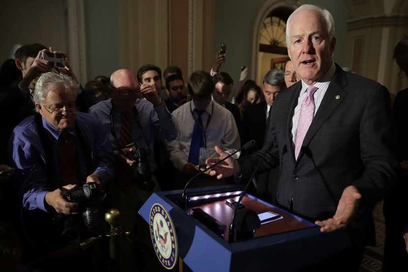 Senate Majority Whip John Cornyn, R-Texas, defended  closed-door discussions between him and...