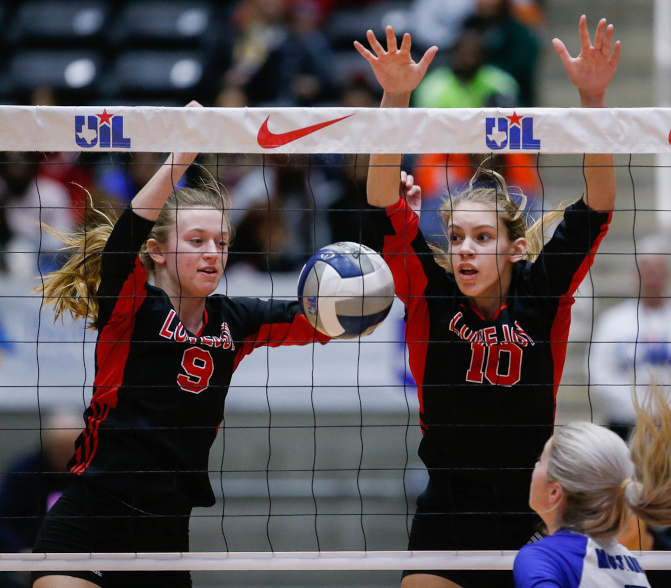 LovejoyÃs Averi Carlson (9) and Grace Milliken (10) fail to block FriendswoodÃs Makensy...