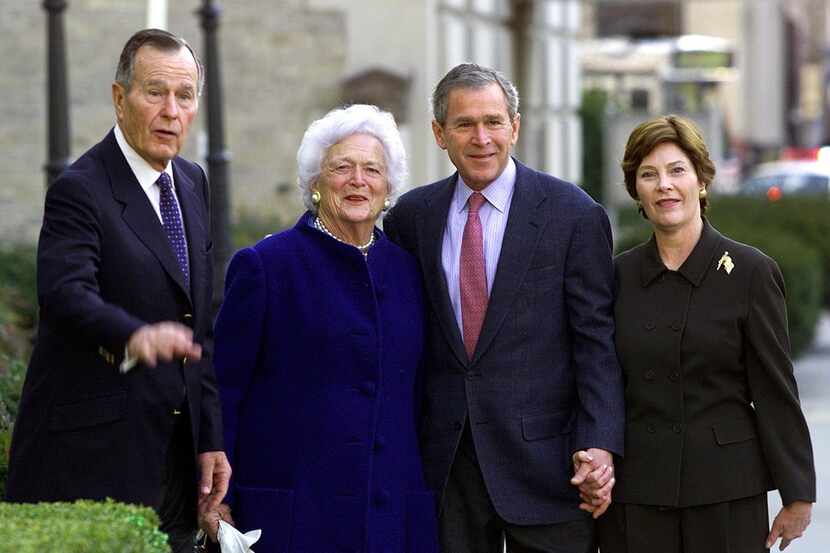 In this file photo taken on Jan. 26, 2002, President George W. Bush, his wife Laura, parents...