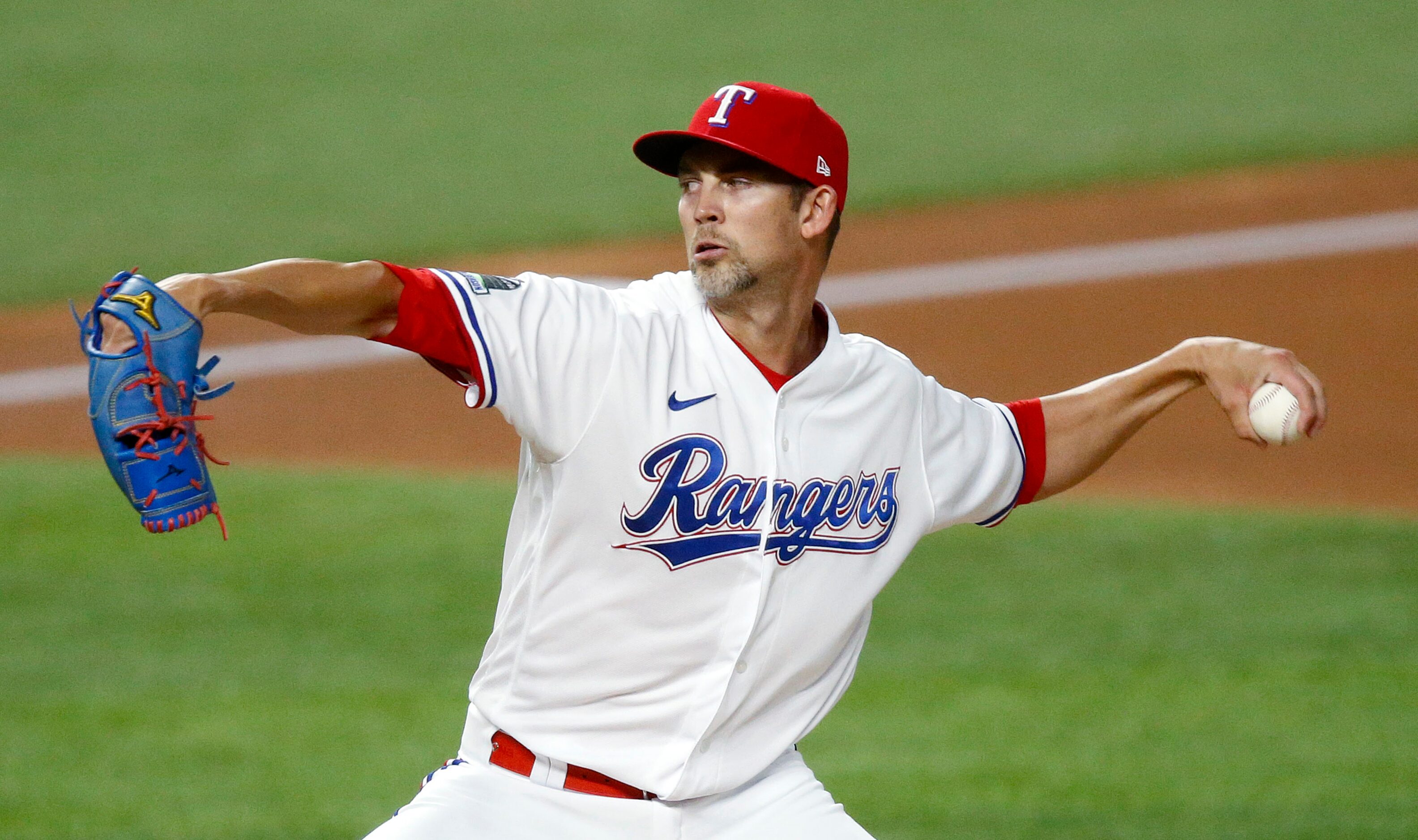 Texas Rangers starting pitcher Mike Minor (23) throws in the first inning against the...