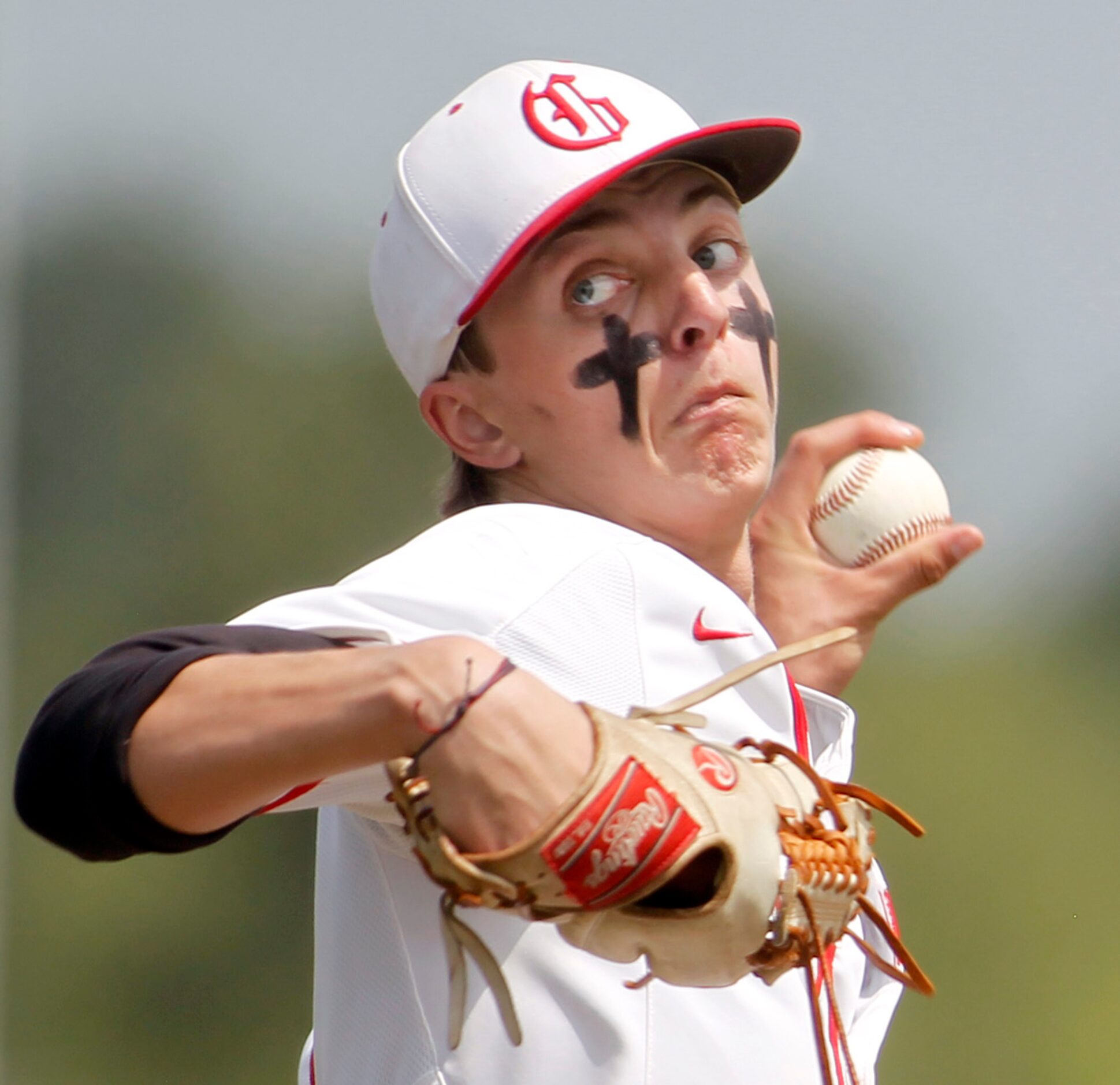 Grapevine pitcher Dasan Hill delivers a pitch to a Midlothian Heritage batter during the top...