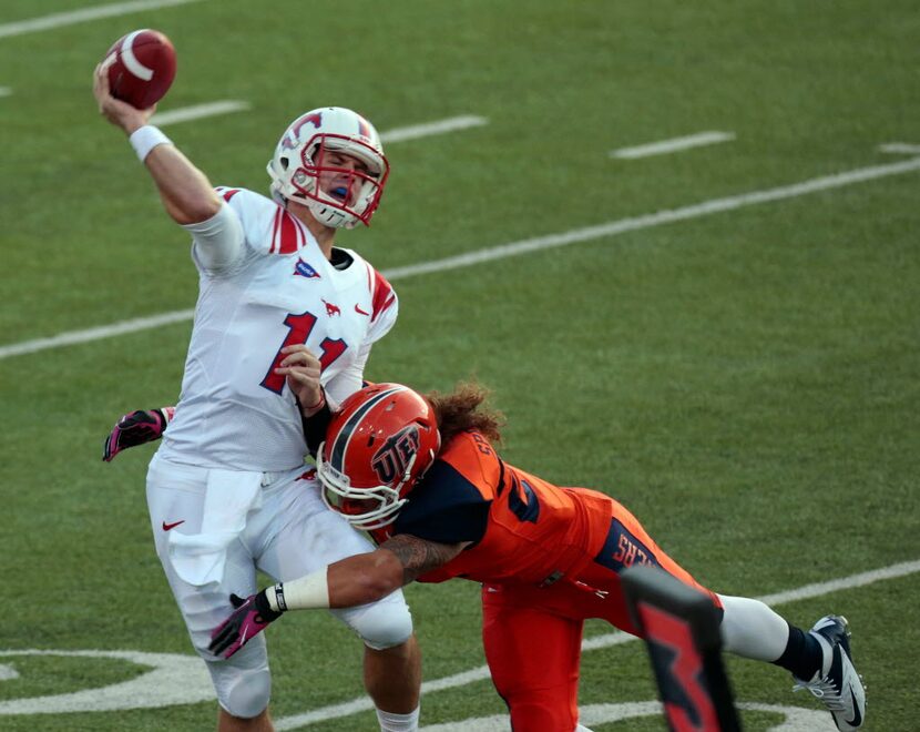 Oct 6, 2012; El Paso, TX, USA; SMU Mustangs quarterback Garrett Gilbert (11) tries to pass...